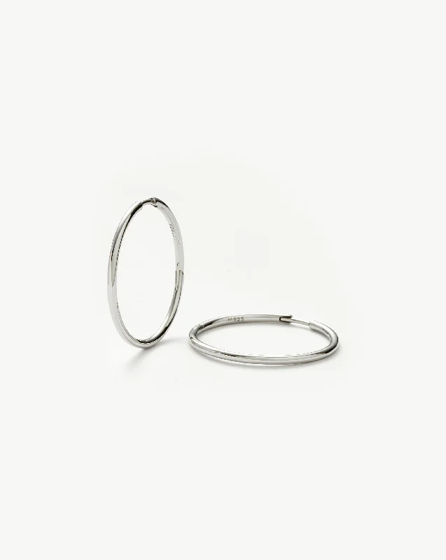 Flash Deals On Fine Jewelry – Shop Before It's Gone Classic Medium Hoop Earrings | Rhodium Plated on Recycled Sterling Silver Flash Deals On Fine Jewelry – Shop Before It's Gone Classic Medium Hoop Earrings | Rhodium Plated on Recycled Sterling Silver