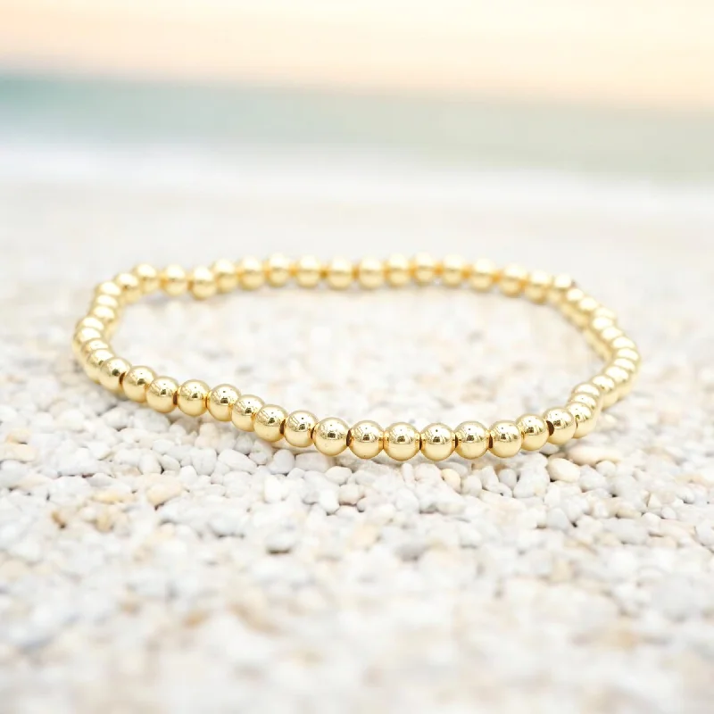 Buy More, Save More On Stunning Jewelry Designs ROYAL CHARM - 18K Gold 4mm Gold Ball Stretch Bracelet Buy More, Save More On Stunning Jewelry Designs ROYAL CHARM - 18K Gold 4mm Gold Ball Stretch Bracelet