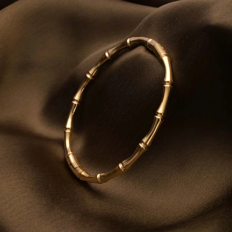 Stunning Jewelry Pieces At The Lowest Prices Ever Gilded Bones Bangle Bracelet